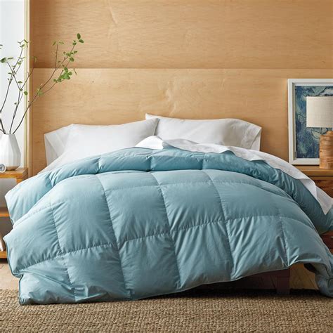 Buttery smooth and practical, this wrinkle-free comforter is luminous and perfect for cold sleepers. 300-thread count. 100% combed cotton sateen. Fill: a lofty, synthetic, 100% polyester fiber fill. OEKO-TEX® STANDARD 100 certification keeps you and your family safe from harmful substances (Certification number: 18.HUS.52388, Hohenstein HTTI)